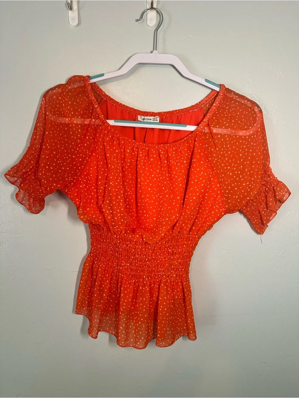 Orange Dot Peplum Smocked Blouse